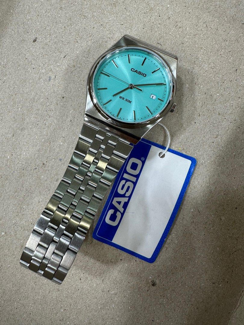 Casio Tiffany MTP-B145D-2A1 (Category: Men's Watches) located in Manila. Submitted by seikowatchfactory (Listing ID 1301683406, Image 3). Description: BNIB 10/10 Model: MTP-B145D-2A1 Price: 3000 pesos Specifications: Size of Case: 40 x 35 x 7.4mm Total Weight: 82g Approx. Battery Life: 3 years on SR621SW Regular Timekeeping 50m Water Resistance Date display Mineral Glass Stainless Steel One-Touch Triple fold clasp Case/Bezel: Two tone Quartz Move