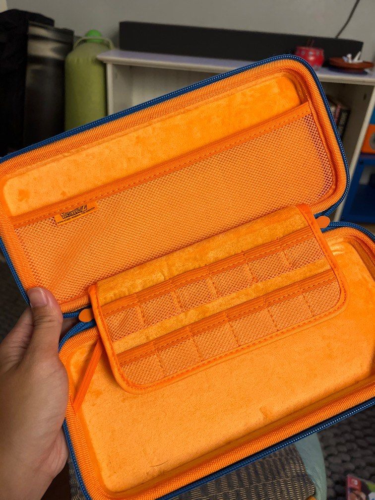 DragonBall Z Carrying Case for Nintendo Switch (Category: Cases & Covers) located in Pasig City. Submitted by artetekto (Listing ID 1301792211, Image 2). Description: IINE Eva Storage Bag for Nintendo Switch Dragonball Z Soldout at their official store already No more packaging, sold as is.