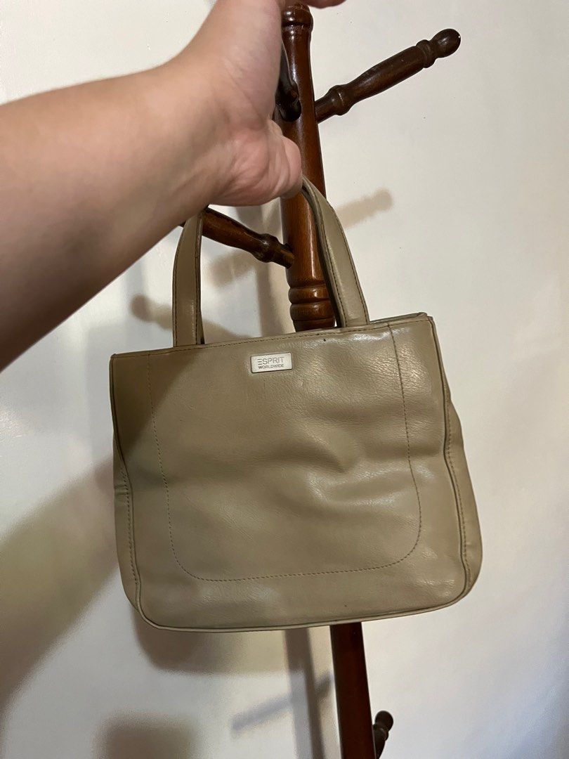 Vintage Esprit beige mini hand bag (Category: Tote Bags) located in Bulacan. Submitted by declutterwitharia (Listing ID 1301724759, Image 2). Description: still useable with some cleaning. leather material still good. flaws seen on pictures price still negotiable for sure buyers pls PM ☺️.