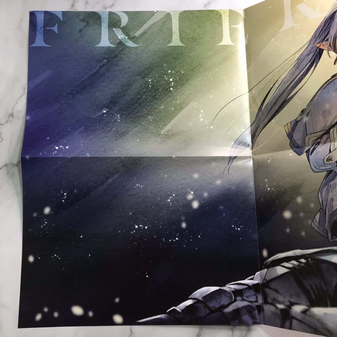 Frieren double-sided poster (Category: Art & Prints) located in Lapu Lapu. Submitted by vdelulucollects (Listing ID 1301850137, Image 3). Description: Size (as displayed): 32 x 59.3 cm From Japan | bought on Melonbooks.