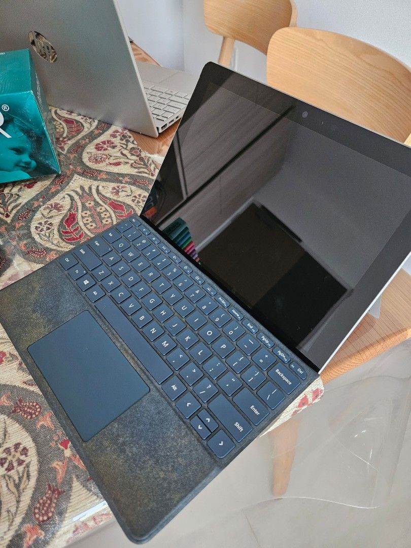 Microsoft Surface Go (Category: Laptops & Notebooks) located in Singapore. Submitted by 21stcenturyf1 (Listing ID 1301780705, Image 1). Description: Used for school previously. Battery is faulty. However, once plugged in to the charger, it can power on. You may bring to shop to get the battery checked. items included: - power supply - stylus pen.
