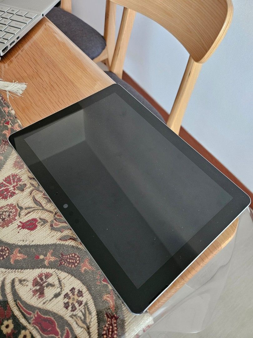 Microsoft Surface Go (Category: Laptops & Notebooks) located in Singapore. Submitted by 21stcenturyf1 (Listing ID 1301780705, Image 3). Description: Used for school previously. Battery is faulty. However, once plugged in to the charger, it can power on. You may bring to shop to get the battery checked. items included: - power supply - stylus pen.