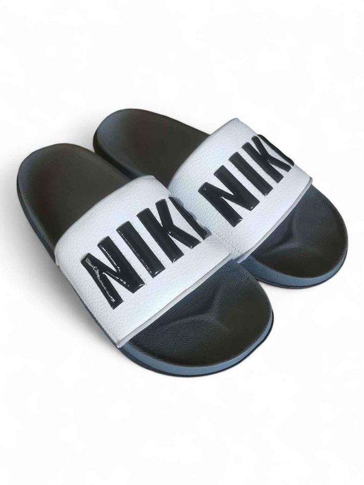 NIKE OFFCOURT SLIDES - US 7 (Category: Slippers & Slides) located in Caloocan City. Submitted by mr.declutterer (Listing ID 1301815809, Image 3). Description: NIKE OFFCOURT SLIDES US 7 Men.