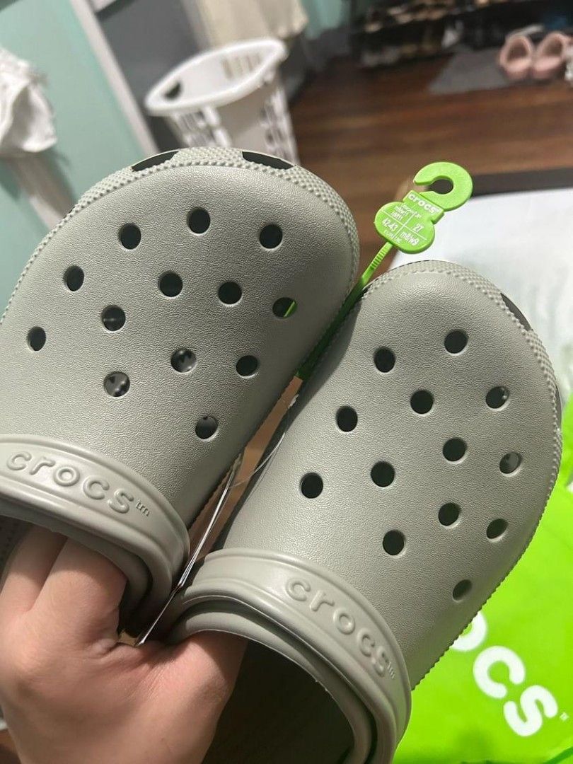 Original Crocs (Category: Slippers & Slides) located in Manila. Submitted by gingercrumbs (Listing ID 1301794482, Image 2). Description: Selling brand new crocs w/ tag. Bought 3290 RFS: Wrong size Price is still negotiable.