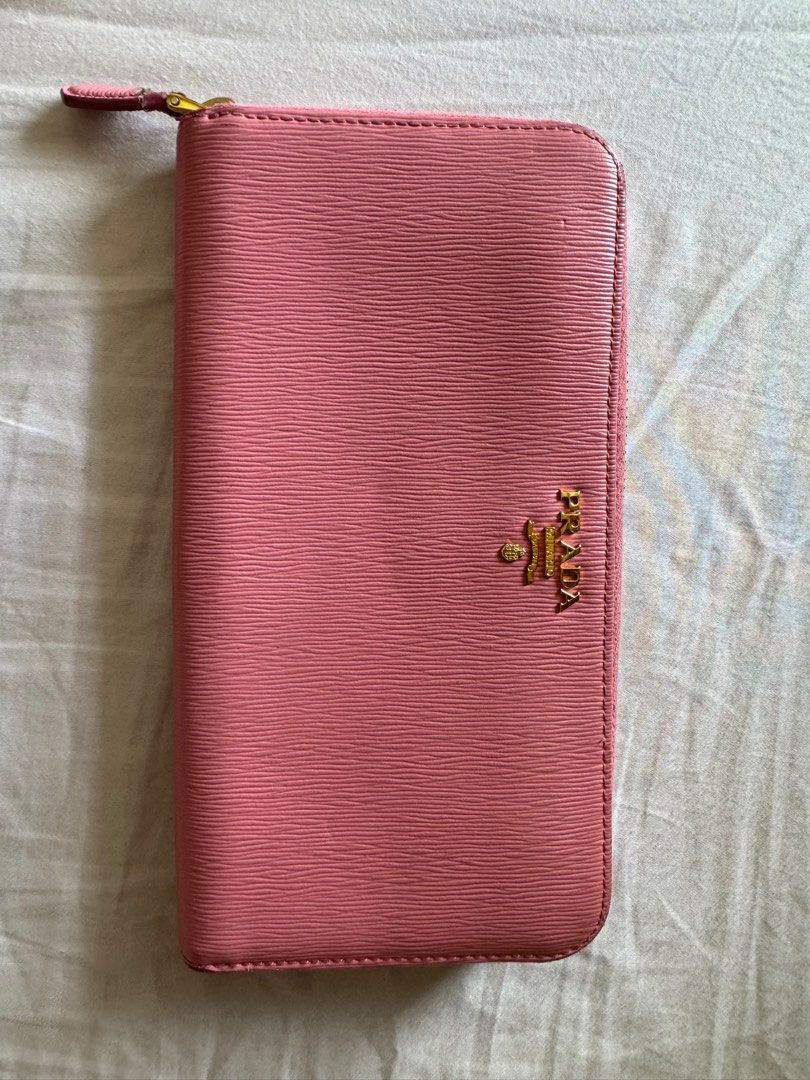 Prada Vitello Pink Long Zip wallet (Category: Luxury Bags & Wallets) located in Pasay City. Submitted by iamkatrisse11 (Listing ID 1301735729, Image 3). Description: (authentic) Prada Vitello Pink Long Zip wallet -heavily used -payment via gcash/bank transfer -shipping c/o buyer.