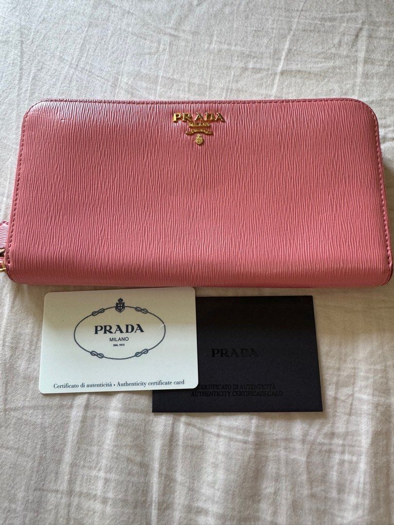 Prada Vitello Pink Long Zip wallet (Category: Luxury Bags & Wallets) located in Pasay City. Submitted by iamkatrisse11 (Listing ID 1301735729, Image 1). Description: (authentic) Prada Vitello Pink Long Zip wallet -heavily used -payment via gcash/bank transfer -shipping c/o buyer.