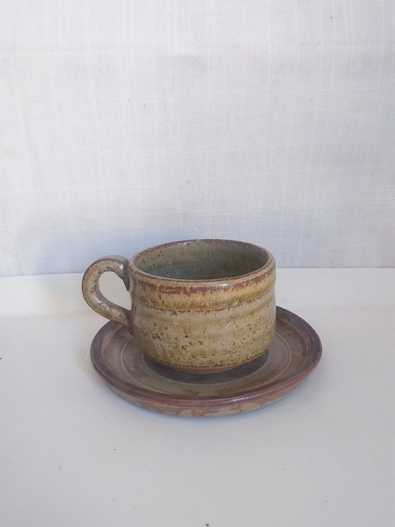 Rustic stoneware mug and saucer (Category: Coffee & Tea Tableware) located in Cavite. Submitted by wishie_collects (Listing ID 1301730271, Image 2). Description: stoneware mug and saucer set.