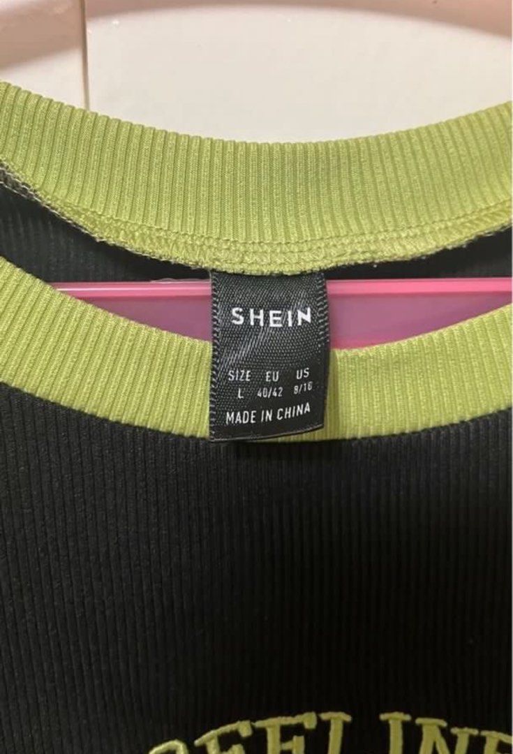 Shein Black and Green Sleeve Tee (Category: Others Tops) located in Quezon City. Submitted by ashyly. (Listing ID 1301712983, Image 3). Description: ✮ Shein Black and Green Sleeve Tee| Size: Large (But can also fit small-medium) | Bought For: ₱263 Selling For: ₱120 — MOP: Gcash for more infos, dm me!.