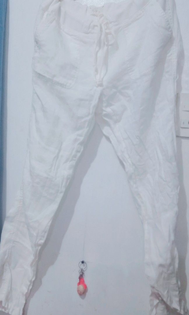 Summer white pants (Category: Other Bottoms) located in Quezon City. Submitted by plus4lessshop (Listing ID 1301853421, Image 1). Description: Very nice in actual best fits to 28-30 waistline.