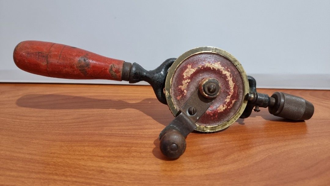 Vintage Egg Beater Hand Drill (Category: Home Improvement Tools & Accessories) located in Binangonan. Submitted by c_r_i_s (Listing ID 1301732801, Image 1). Description: Vintage Egg Beater Hand Drill 30 cm or 11.8 in With light signs of use The 3 jaw chuck works and holds bits tightly Some light wear on the wooden handles Needs lubrication In very good condition.