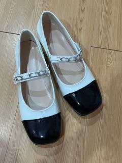 White and black cap mary janes with pearl detail