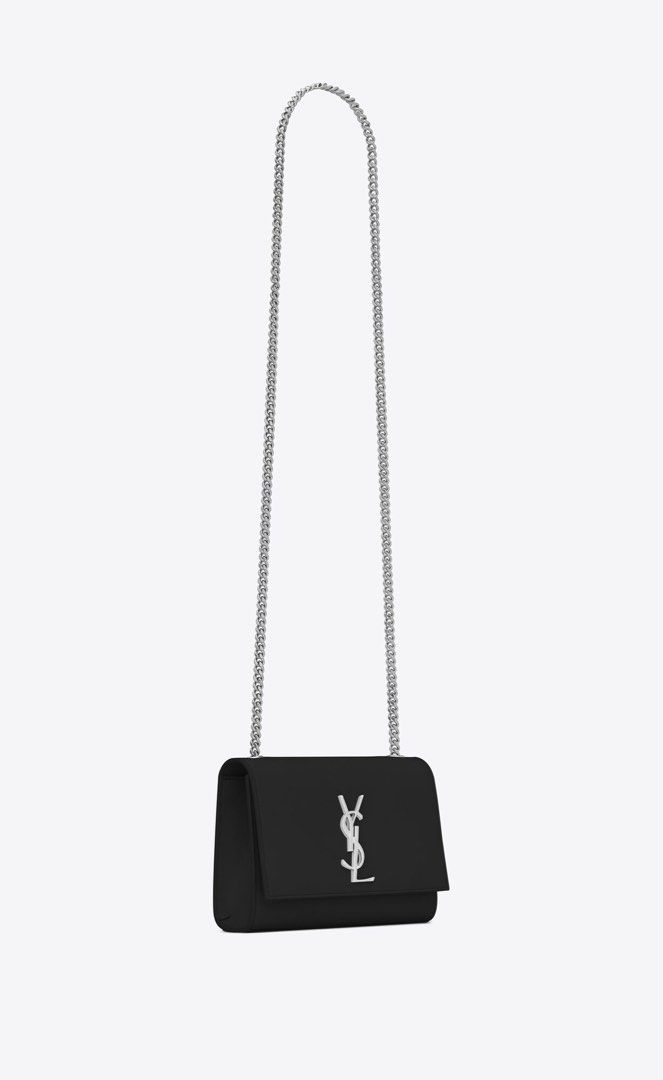 YSL Small Monogram Kate Bag in Black (Category: Bags & Wallets) located in Singapore. Submitted by thebasicsshop (Listing ID 1301673923, Image 3). Description: RTP $2700, bought from Ion boutique never used, too small for me! Comes in full set - dust bag & receipt. Also comes with a free custom insert that i bought for it. .