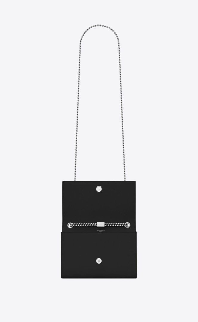 YSL Small Monogram Kate Bag in Black (Category: Bags & Wallets) located in Singapore. Submitted by thebasicsshop (Listing ID 1301673923, Image 2). Description: RTP $2700, bought from Ion boutique never used, too small for me! Comes in full set - dust bag & receipt. Also comes with a free custom insert that i bought for it. .