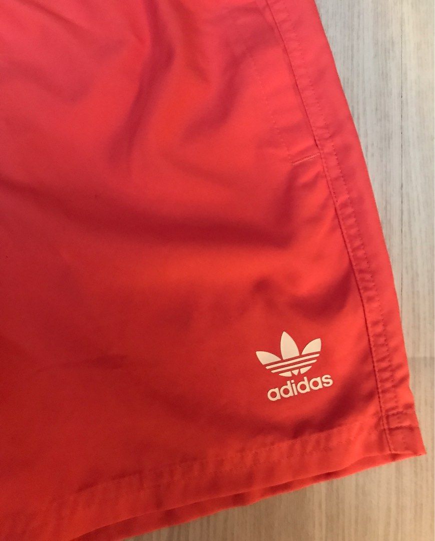 Adidas Adicolor Essential Trefoil Swim Short (Category: Activewear) located in Manila. Submitted by mr.quicky (Listing ID 1301923211, Image 2). Description: Adidas Adicolor Essential Trefoil Swim Short Brand new with tag Side pocket and 1 back pocket Garterize Legit below srp.