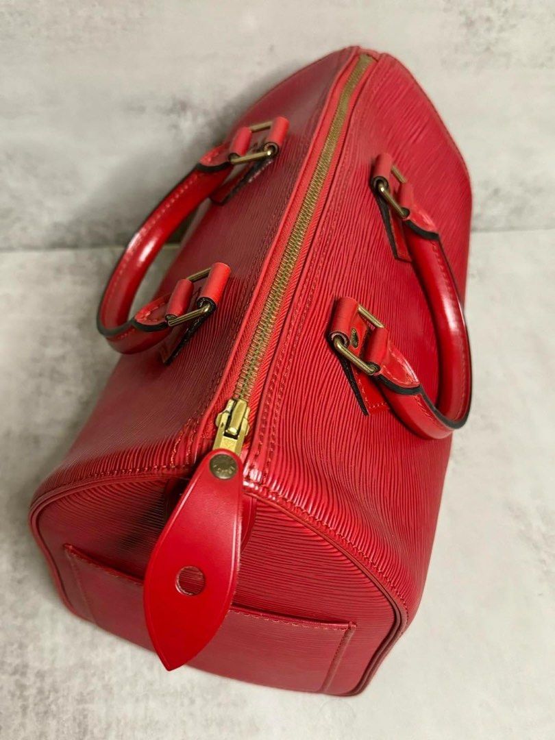 Louis Vuitton Speedy 25 Red Epi Leather (Category: Luxury Bags & Wallets) located in Manila. Submitted by bagislifeshop (Listing ID 1302019290, Image 2). Description: Favorite 🔥🔥🔥 On Hand in PH 🇵🇭 100% Authentic Louis Vuitton Speedy 25 Red Epi Leather Condition 9/10 Comes with Standard Dustbag .
