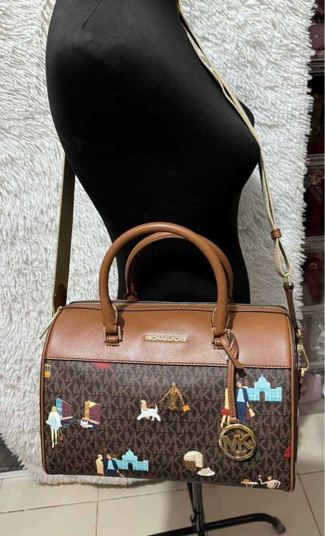 Mk medium duffle city girls (Category: Luxury Bags & Wallets) located in Pasig City. Submitted by jackie_ginger (Listing ID 1302033497, Image 3). Description: Onhand with tag and care card 💯orig from US.
