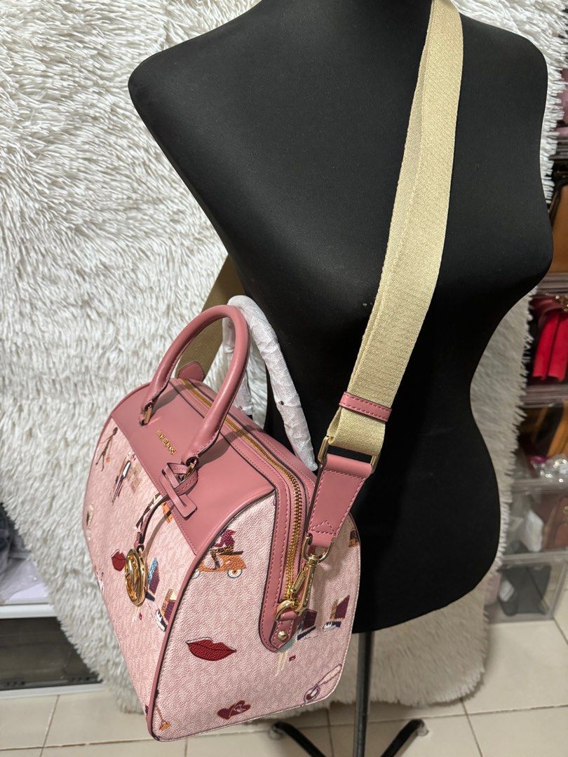 Mk medium duffle city girls (Category: Luxury Bags & Wallets) located in Pasig City. Submitted by jackie_ginger (Listing ID 1302033497, Image 2). Description: Onhand with tag and care card 💯orig from US.