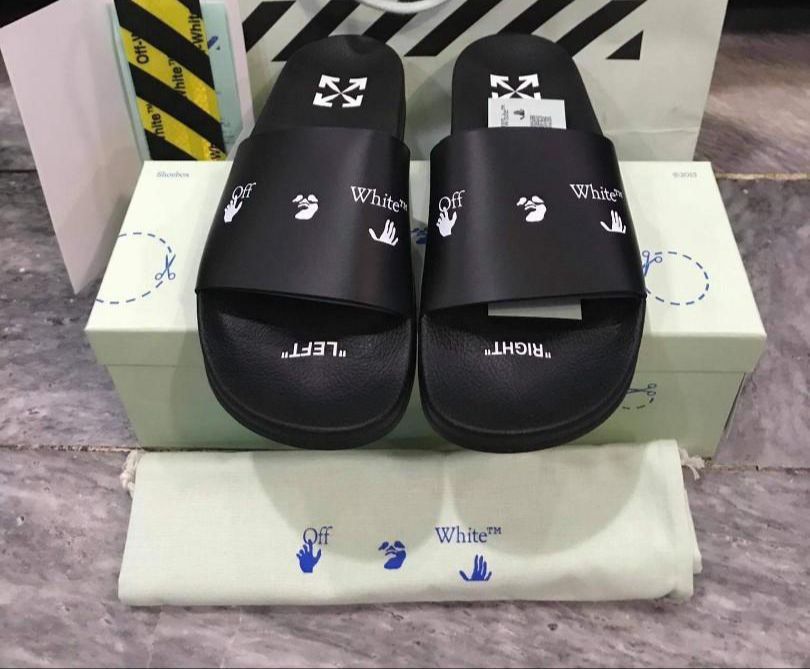 Offwhite slide (Category: Flipflops and Slides) located in Bagan Serai. Submitted by fiezthrift_ (Listing ID 1301869233, Image 1). Description: Original not fake ‼️‼️ Condition 9.5/10 Used like new Complete box smua paper bag tkdak.