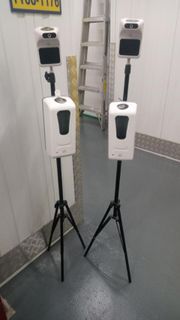 Temperature scanner with sanitizer