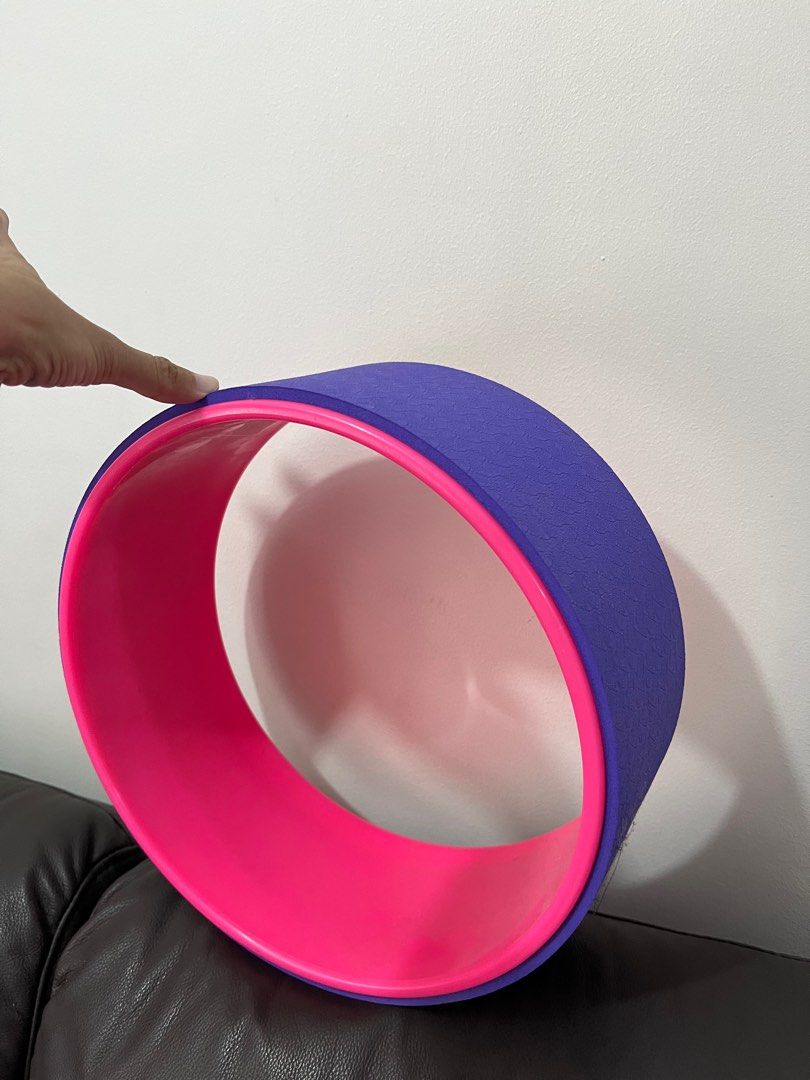 Yoga wheel (Category: Toning & Stretching Accessories) located in Quezon City. Submitted by tipid (Listing ID 1301905258, Image 2). Description: Brand new never used. Purple and pink color Price negotiable.