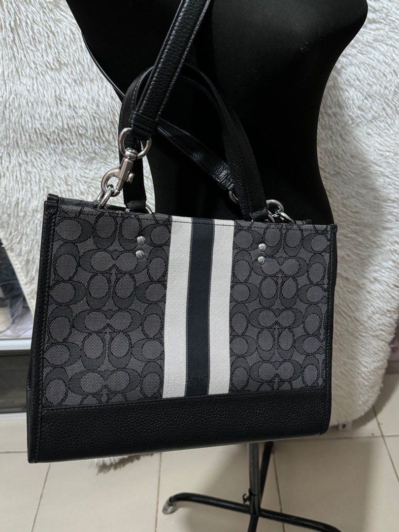 Coach dempsey caryall black (Category: Luxury Bags & Wallets) located in Pasig City. Submitted by jackie_ginger (Listing ID 1302211149, Image 3). Description: Onhand with tag and care card 💯orig from US.