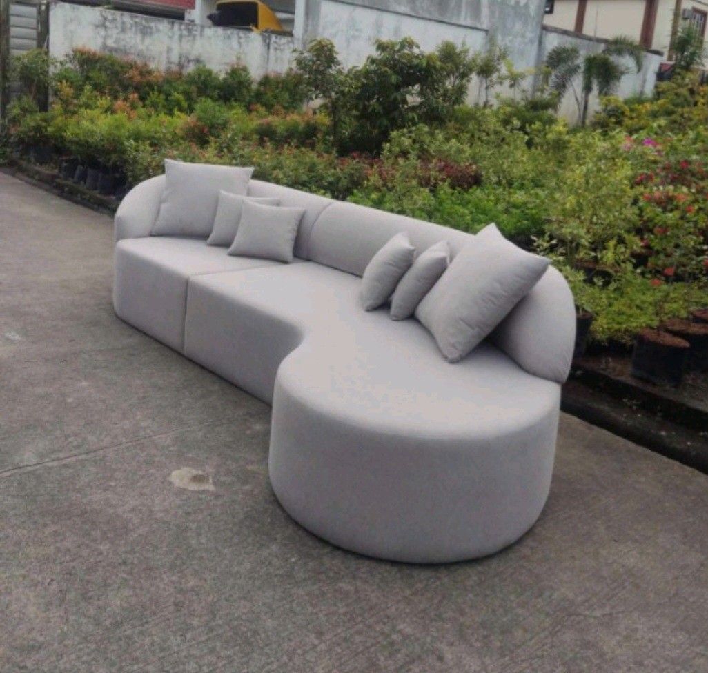 RUSH! CURVE SOFA (85K) (Category: Sofas) located in Quezon City. Submitted by tetil22365 (Listing ID 1302151048, Image 3). Description: CURVE SOFA - 85k - Solid Mahogany wood frame in wood stain finish - Seat and backseat in Uratex Foam. - upholstered in Larry's Fabric(stain resistant) Dimensions: W3300mm D1050mm H1700mm Price Negotiable RFS: size is big for our living area SHipping fee: c/o buyer.