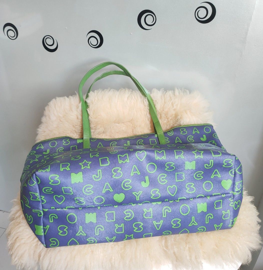 MARC JACOBS Letter Monogram Tote (Category: Luxury Bags & Wallets) located in Tuguegarao City. Submitted by roab_ (Listing ID 1302041176, Image 3). Description: 🔸 Condition: Pre owned 🔸Color: Navy blue and neon green 🔸 Size: Measures approximately 52cm L X 27H X 15 W 🔸 I ship fast. 🔸 Shipping/delivery fee will be shouldered by buyer. Payment: BDO Gcash Shipping: LBC.