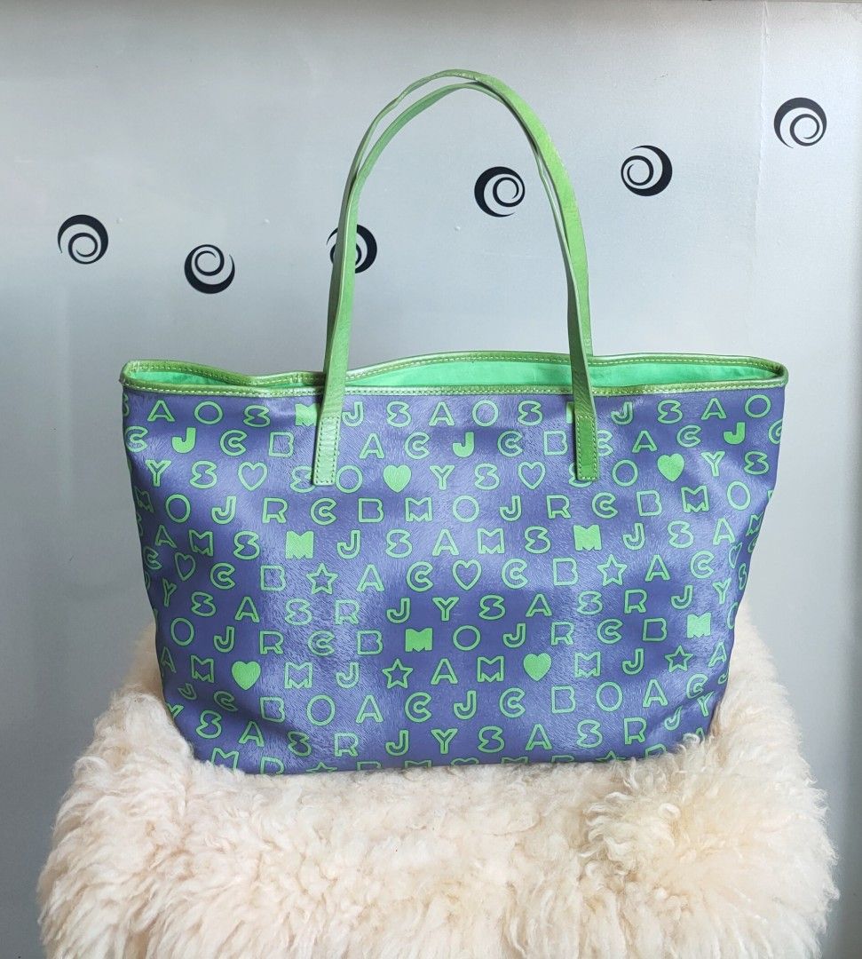 MARC JACOBS Letter Monogram Tote (Category: Luxury Bags & Wallets) located in Tuguegarao City. Submitted by roab_ (Listing ID 1302041176, Image 2). Description: 🔸 Condition: Pre owned 🔸Color: Navy blue and neon green 🔸 Size: Measures approximately 52cm L X 27H X 15 W 🔸 I ship fast. 🔸 Shipping/delivery fee will be shouldered by buyer. Payment: BDO Gcash Shipping: LBC.