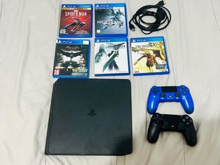 Playstation 4 Slim  (1 TB) + 5 Games, 2 controllers