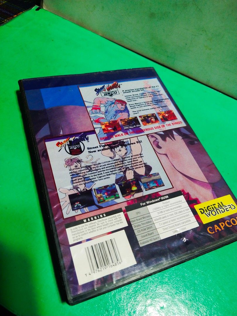 "Street Fighter Collection"/2 CD ROM/CAPCOM/UNTESTED (Category: Nintendo) located in Del Monte. Submitted by zurckram777 (Listing ID 1302213594, Image 2). Description: "Street Fighter Zero Collection" 2 CD ROM. For Windows 95/98. Sorry UNTESTED because wala po akong pang test. Ok naman yung casing at walang gasgas o damage yung mga CD. In VG cond. Lahat ito for P650. (Dien Bien Phu cont.).