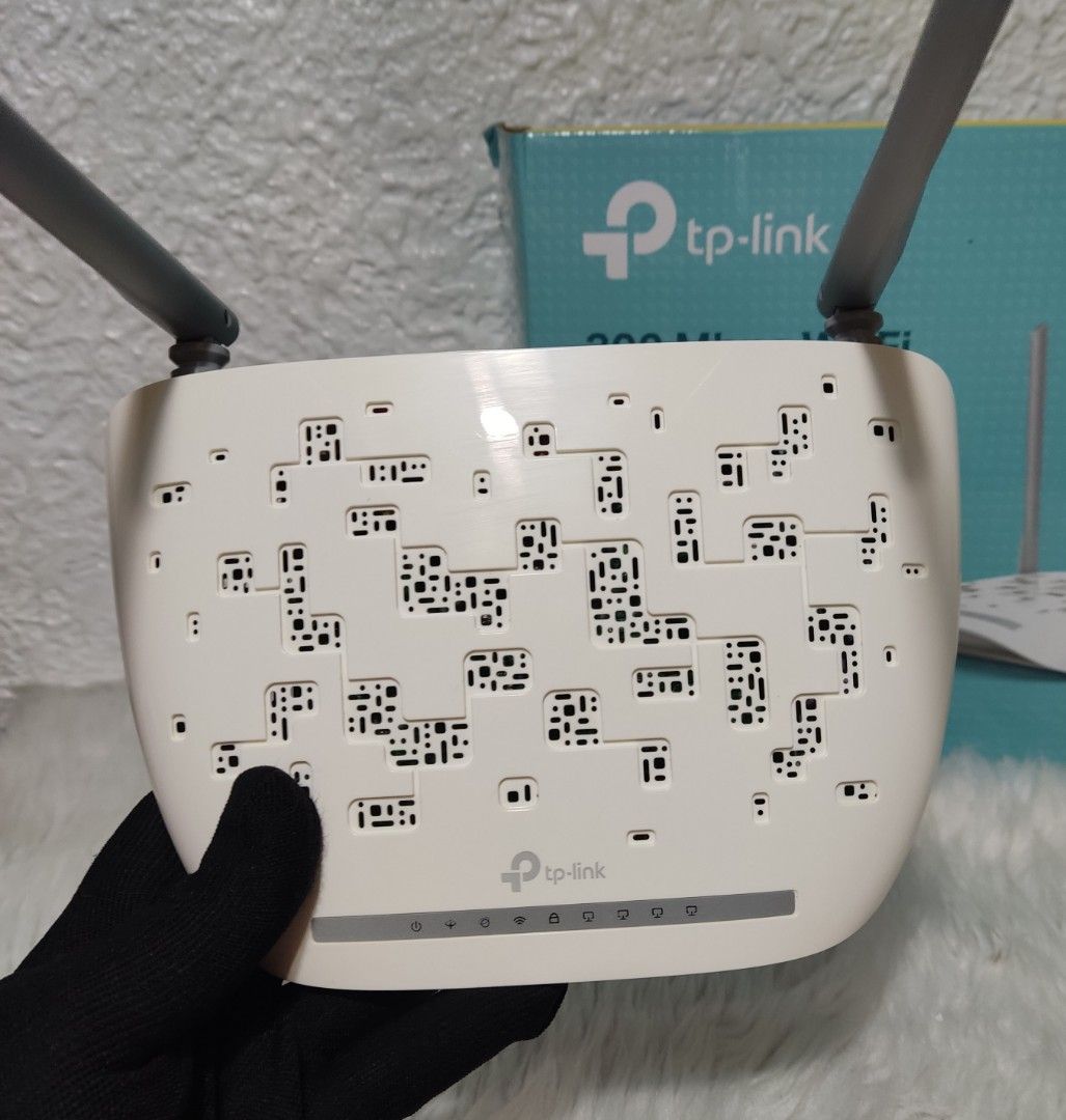 TP-link ADSL2+ Modem Router (Category: Networking) located in Paranaque City. Submitted by dalle_closet (Listing ID 1302063316, Image 2). Description: Slightly used pa. 300mbps wifi router.