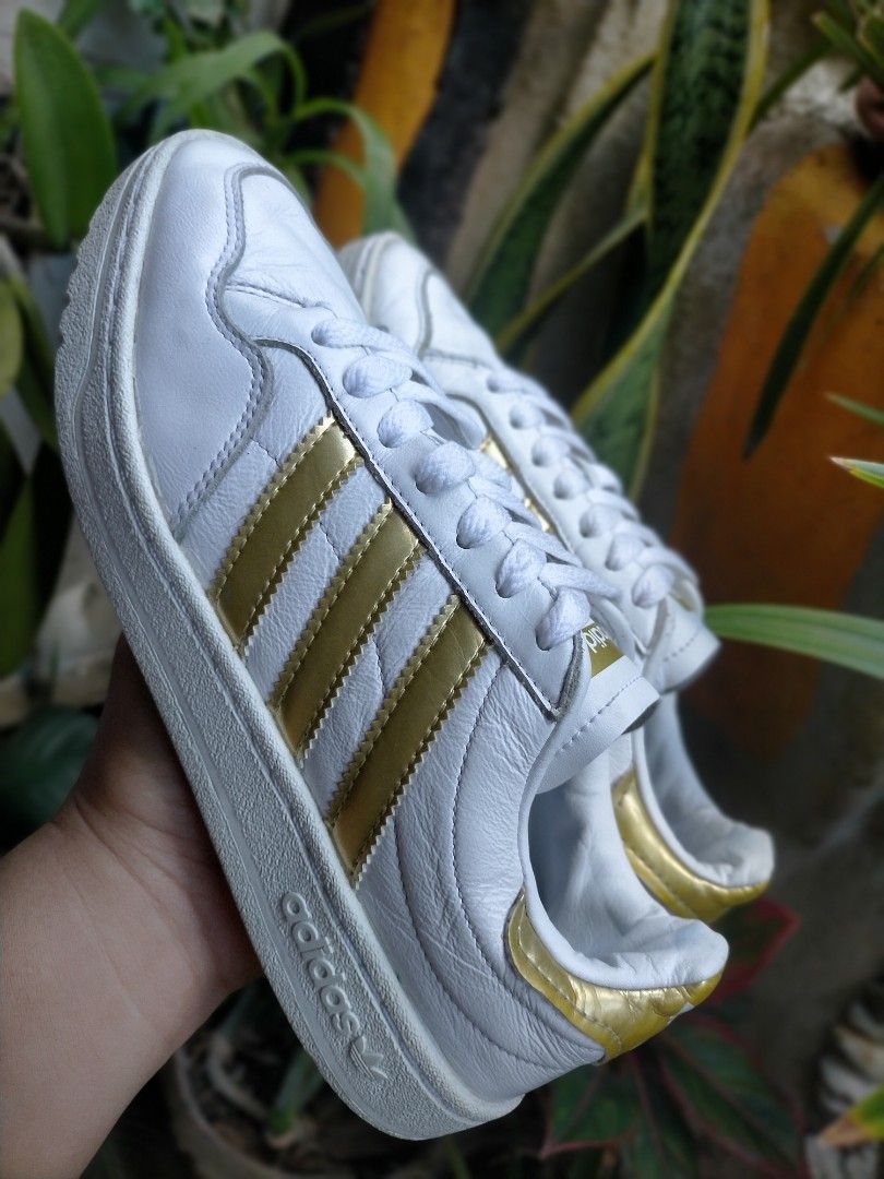 Adidas womens shoes with gold stripes 2025