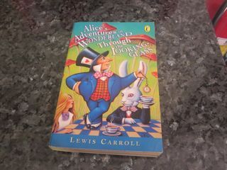 ALICE ADVENTURES INWONDERLAND THROUGH THE LOOKING GLASS BY LEWIS CARROLL, PAPERBACK,USED GOOD COND