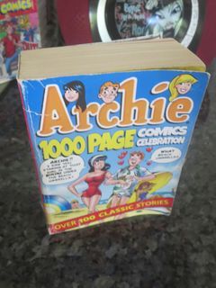 ARCHIE COMICS ,1000 PAGE COMICS CELEBRATION  OVER 100 CLASSIC STORIES, USED BOOK IN GOOD CONDITION ..