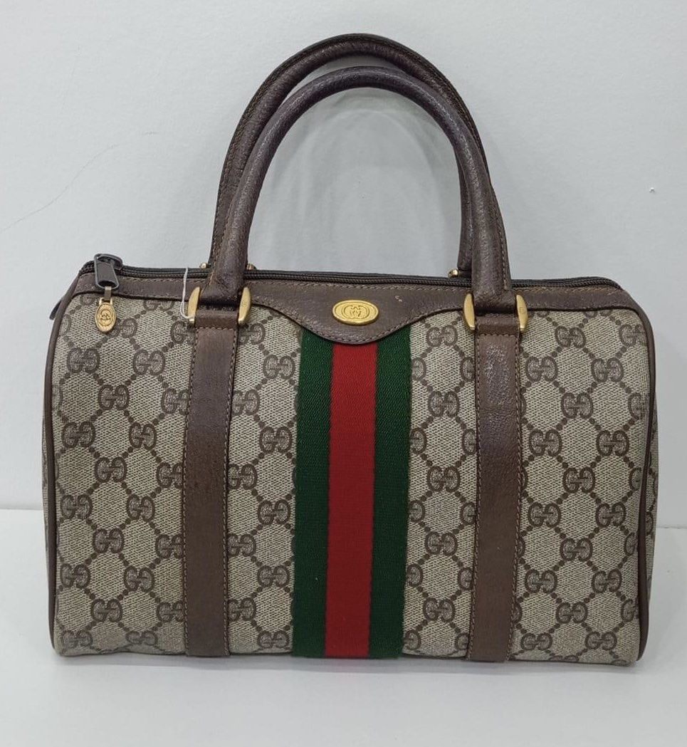 Authentic Gucci (Category: Luxury Bags & Wallets) located in Manila. Submitted by chloe_luxuries (Listing ID 1302224052, Image 1). Description: Guaranteed original Gucci boston cherry line bag Still in good condition No inclusion bag only Pm for more details.