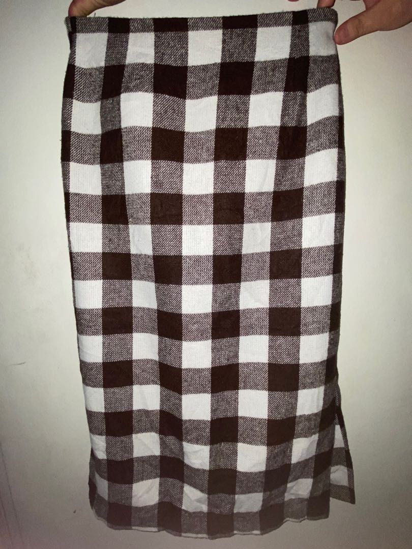 Brown and White Plaid Midi Skirt (Category: Skirts) located in Pasig City. Submitted by cootgoat (Listing ID 1302325561, Image 2). Description: - fits up to 34in waist - thrifted, needs washing - with side zipper - back is garterized helping tags: plaid, gingham, checkered, plus size, maxi skirt, cottagecore, office siren, western, cowboy, cowgirl.