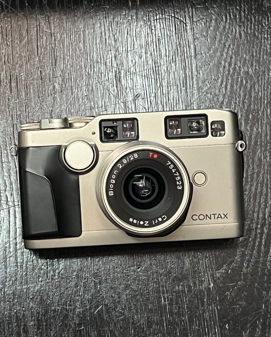 Contax G2 (Category: Cameras) located in Singapore. Submitted by benphotosg (Listing ID 1302276244, Image 1). Description: Contax G2 with 28mm F2.8 Biogon ,camera is fully functional,lens is clean and clear..