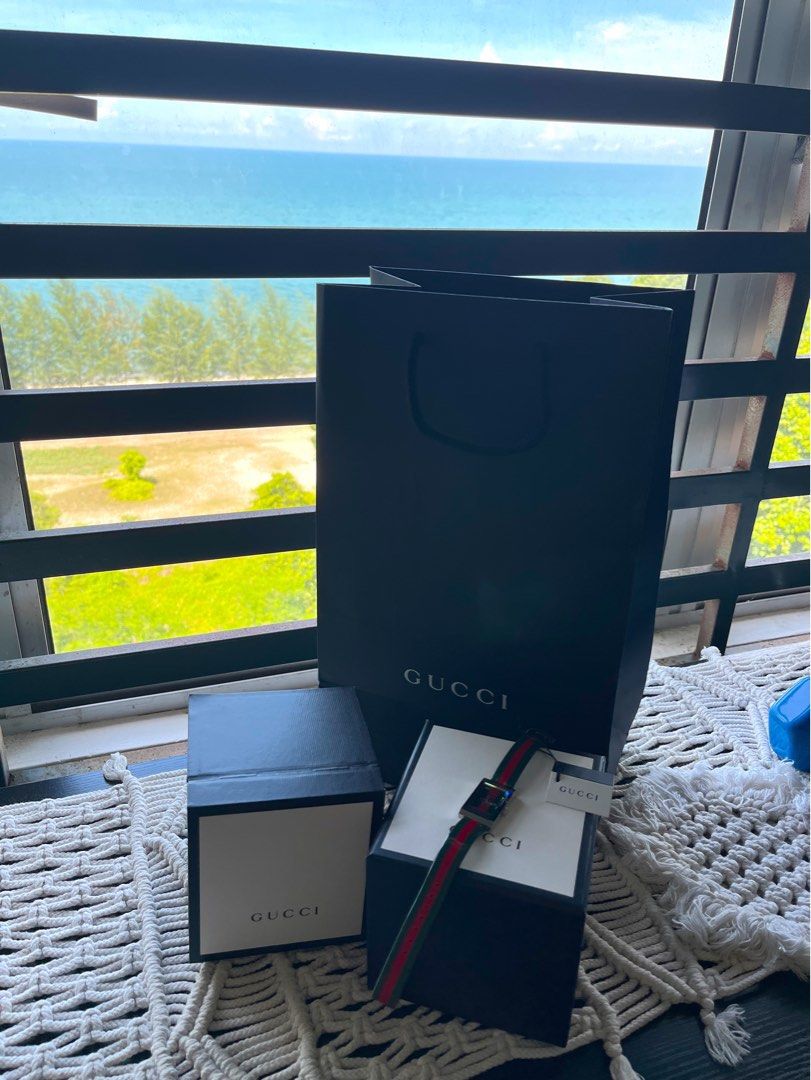 Gucci (Category: Watches) located in Kuantan. Submitted by nadia222 (Listing ID 1300427821, Image 2). Description: gucci watch dgn waranty.. like new jarang sgt pakai sb kita byk jam.. xrugi beli.. complete set with tag price .. waranty masih ade .