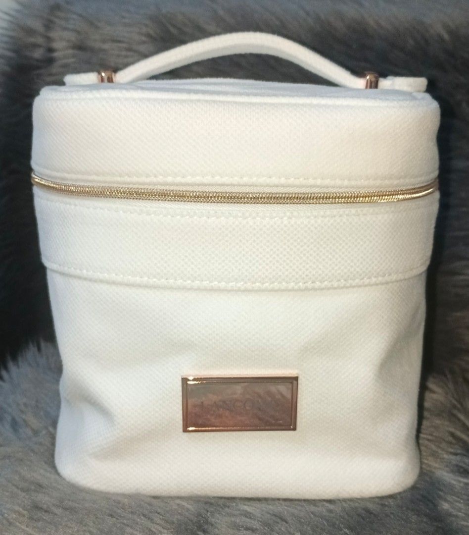 Lancome Vanity Bag (Category: Makeup) located in Antipolo. Submitted by legoninos.legoninas (Listing ID 1302288226, Image 1). Description: white with rose gold zipper Brand new.
