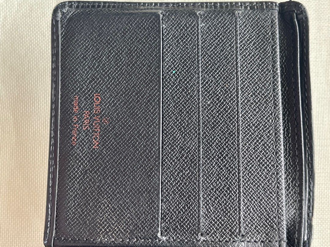 Louis Vuitton Black Epi Bi-Fold Wallet (Category: Wallets & Card Holders) located in Marikina City. Submitted by elle.desmar (Listing ID 1302245144, Image 3). Description: Louis Vuitton Wallet Condition: 8/10 Minor scratches but no peeling inside. Please see photos for details. No inclusions but guaranteed authentic. MOP: Gcash/BPI/Seabank No COD. .
