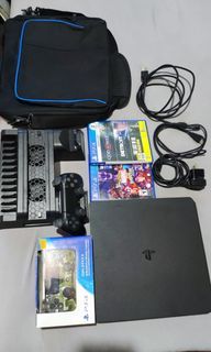 PS4 Slim 500 GB w/ Bag, Dock, 2 Controllers and 3 games