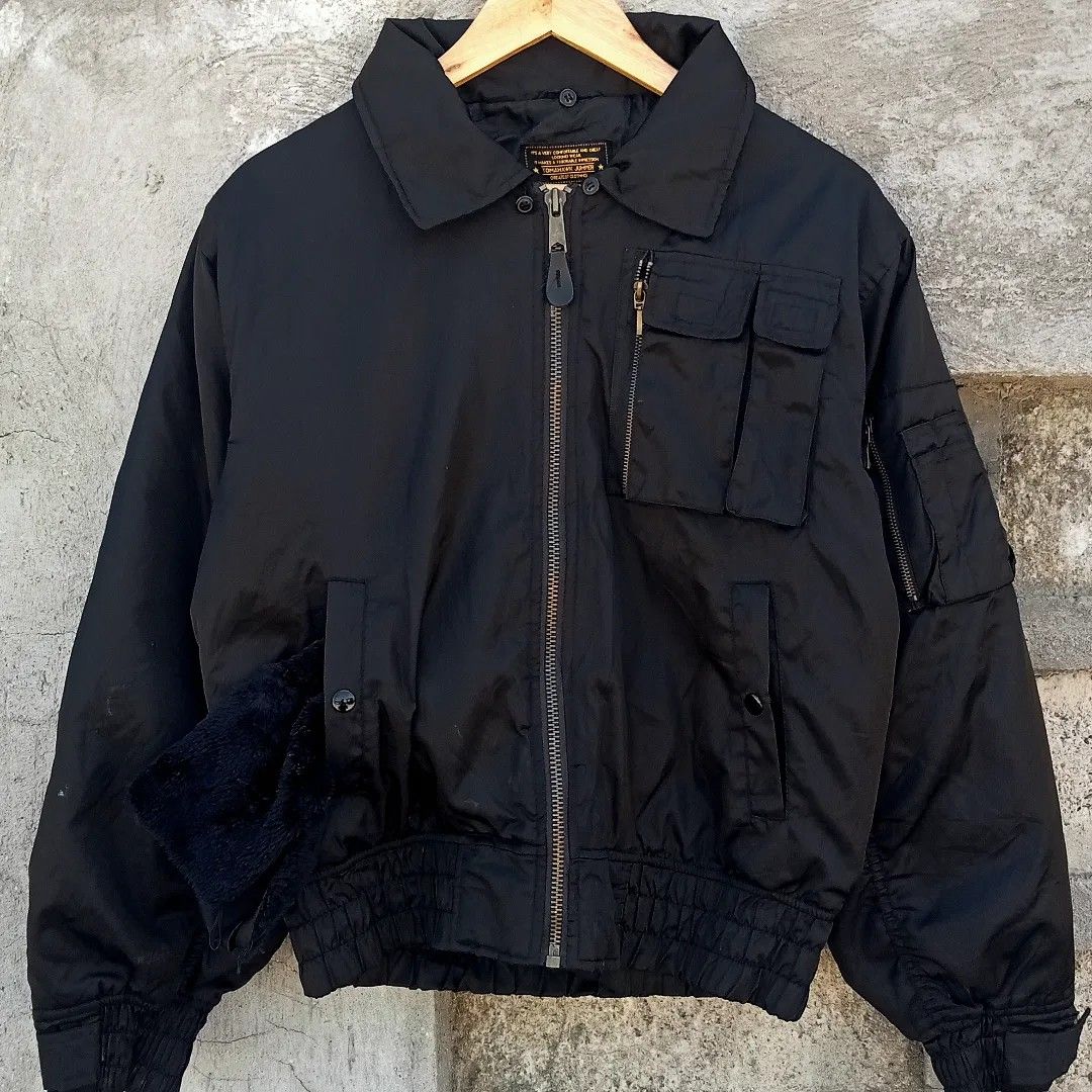 Vintage 1980s-90s Tomahawk Aviator Bomber Jacket (Category: Coats, Jackets and Outerwear) located in Manila. Submitted by vintagesoulph (Listing ID 1302289928, Image 2). Description: Vintage 1980s-90s Tomahawk Aviator Bomber Jacket • Boxy Large (26.5" x 23") • Historical war piece turned into cozy timeless fashion trend • Detachable sherpa lined collar • With two inner "cigarette" pockets ISSUE: small cigarette burn hole at the right sleeve & som