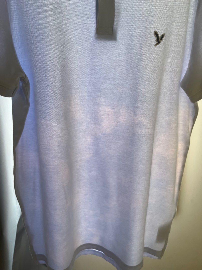 American Eagle Polo Shirt Slim Fit (Category: Tshirts & Polo Shirts ) located in Manila. Submitted by eondumas (Listing ID 1302464359, Image 3). Description: Used it less than 10x, got a bleached stain on it thats why I never used it again! It is not very visible in indoors.