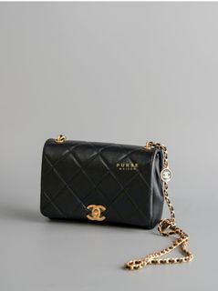 Chanel CC Flap Seasonal Black Lambskin and Gold Hardware Bag (Microchip)