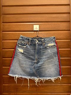 Denim skirt with red accent