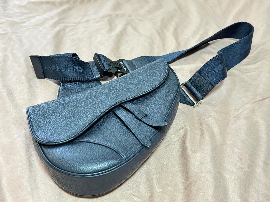 Dior Saddle for Men (Category: Luxury Bags & Wallets) located in Quezon City. Submitted by jrkangta (Listing ID 1302550776, Image 1). Description: Authentic Dior Men’s Saddle bag Dark blue Leather (better than oblique canvas. does not stain) Brand new price: 205,000pesos Inclusion: Dior Saddle Bag (for men / women) Box Replacement dust bag RFS: Need bigger bag for travel. Rarely used recently. For meetups only ( QC area).
