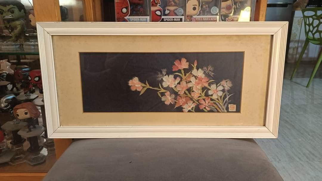Flower art on white frame (Category: Frames & Pictures) located in Quezon City. Submitted by matetdevis13 (Listing ID 1302395779, Image 2). Description: Flower art on white frame Solid wood frame, glass cover Price : 1,000 23.5 x 12 inches In good condition Code rusdha.