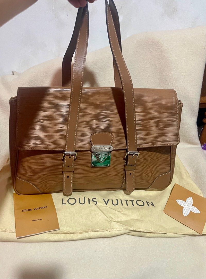LV Epi segur MM (Category: Luxury Bags & Wallets) located in San Pablo. Submitted by prelovedbymistyblue (Listing ID 1302391259, Image 1). Description: Authentic LV epi Shoulder bag. Comes with dust bag and care cards. Adjustable belt type handle. With signs of use on the epi leather. Measures 13.9 x 9.5 inches. Selling low for 25500, down to 24000, then 22,000. Code: AR1016 RFS: too many bags, need to declutter .