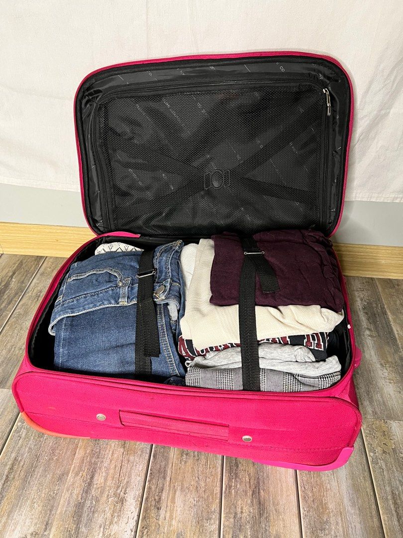 Pink luggage carry on (Category: Luxury Bags & Wallets) located in Quezon City. Submitted by miahranises0028 (Listing ID 1302518362, Image 2). Description: Hardwares are still in good condition. Scuffs and scratches here and there and needs cleaning. No issues in the handle still very sturdy and reliable. Australian brand. Clothes inside are not included. For reference only..