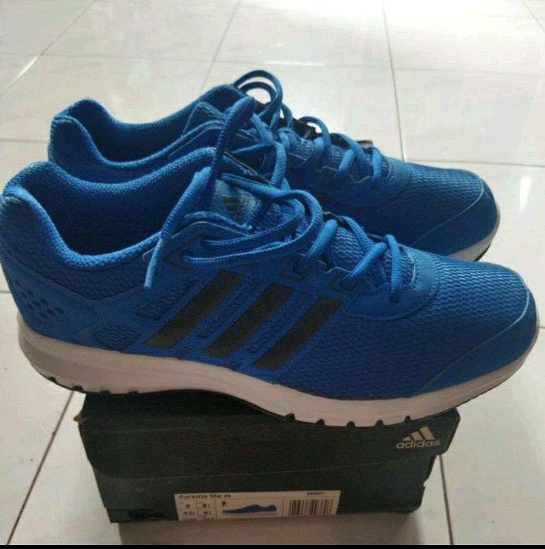Foto sepatu adidas warna biru shop